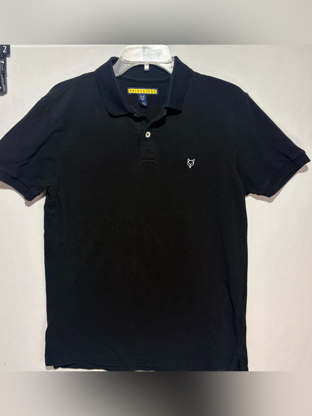 Men’s Black Polo Shirt with Small Fox Emblem